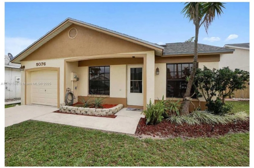 Single family home offering 3 bedrooms, 2 baths, a garage and a - Beach Home for sale in Lake Worth, Florida on Beachhouse.com