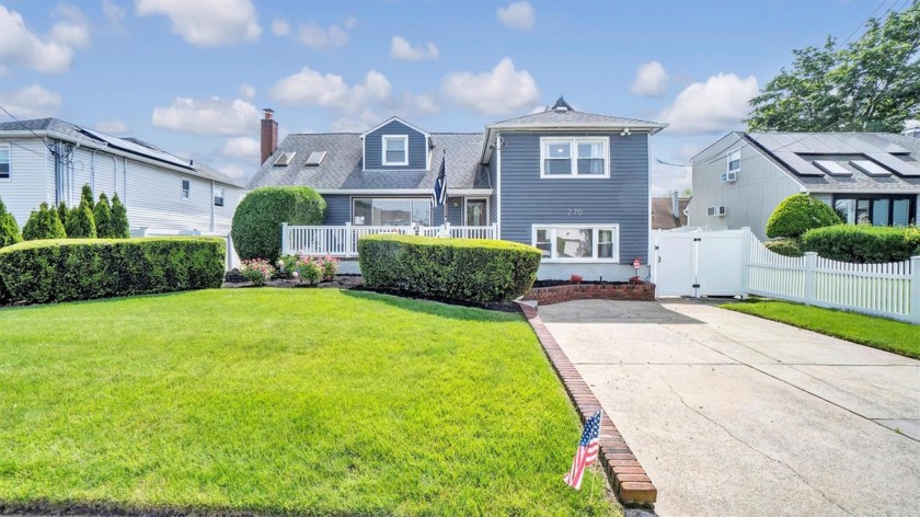 Nestled in the desirable and pristine Harbor Isle community - Beach Home for sale in Island Park, New York on Beachhouse.com