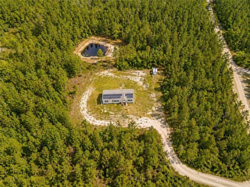 Over 6 acres of privacy and space! This beautiful Timberline - Beach Home for sale in Townsend, Georgia on Beachhouse.com
