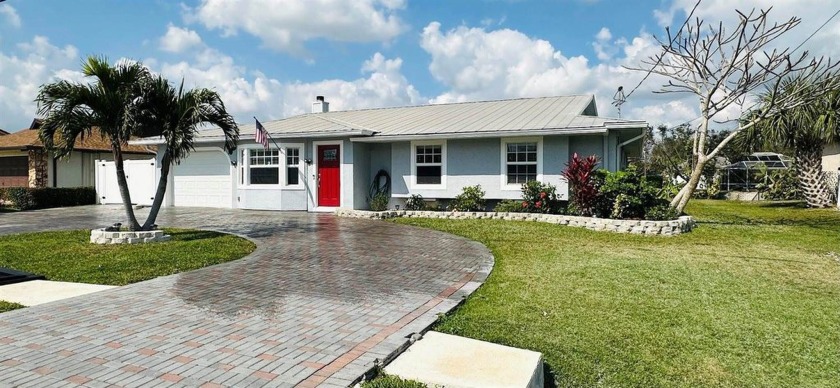 PRICE DROP!! Don't be fooled by a quick glance! This home is an - Beach Home for sale in Port Saint Lucie, Florida on Beachhouse.com
