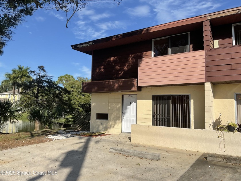Welcome to 2416 N Tropical Trail, a super cute townhome nestled - Beach Townhome/Townhouse for sale in Merritt Island, Florida on Beachhouse.com