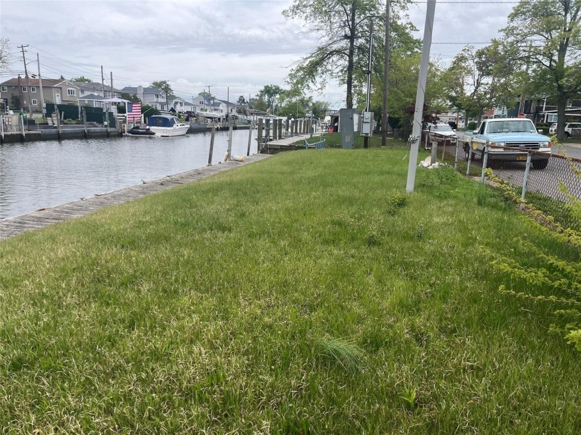 Rare Opportunity to own 80 feet of waterfront on a wide canal - Beach Lot for sale in Lindenhurst, New York on Beachhouse.com