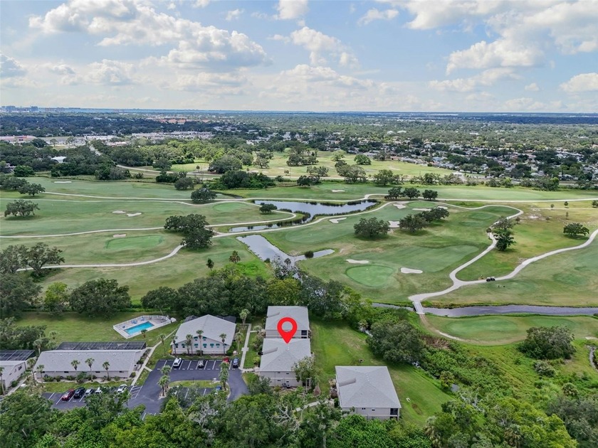 Discover this beautifully updated main floor condo 2-bedroom - Beach Condo for sale in Sarasota, Florida on Beachhouse.com