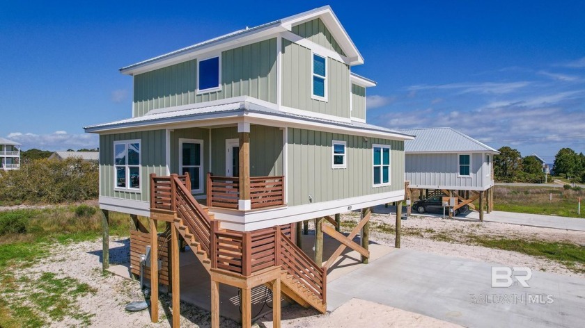 This Gold Fortified 4 bed, 3 bath residence spans 1,709 square - Beach Home for sale in Gulf Shores, Alabama on Beachhouse.com