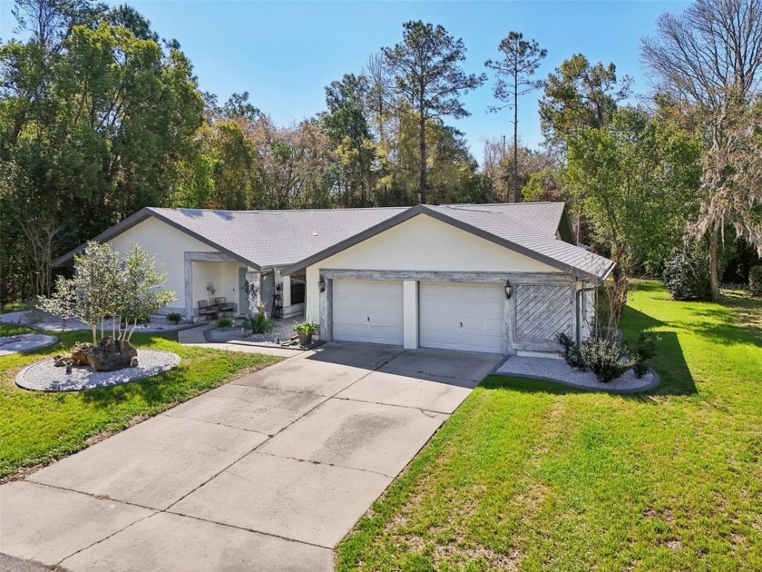 This EXPANSIVE 4-BEDROOM, 3-BATH HOME in SUGARMILL WOODS isn't - Beach Home for sale in Homosassa, Florida on Beachhouse.com