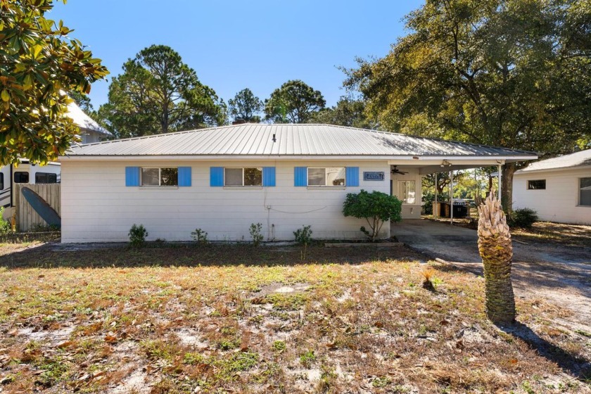 This rare find on the serene shores of Lake Trace features a - Beach Home for sale in Santa Rosa Beach, Florida on Beachhouse.com