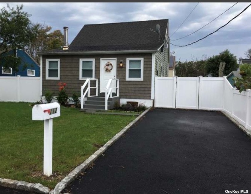 Welcome Home to this Beautiful updated 3 B/R Cape which - Beach Home for sale in Shirley, New York on Beachhouse.com
