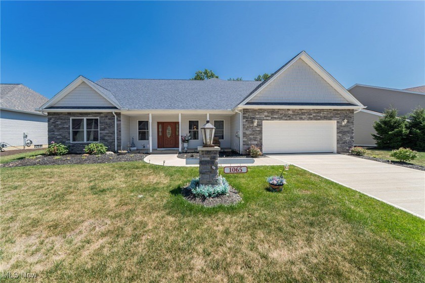 Welcome to this stunning custom-built ranch home, nestled in one - Beach Home for sale in Vermilion, Ohio on Beachhouse.com