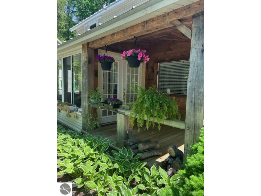 Charmingly updated historic Alden home in an ideal location - Beach Home for sale in Alden, Michigan on Beachhouse.com
