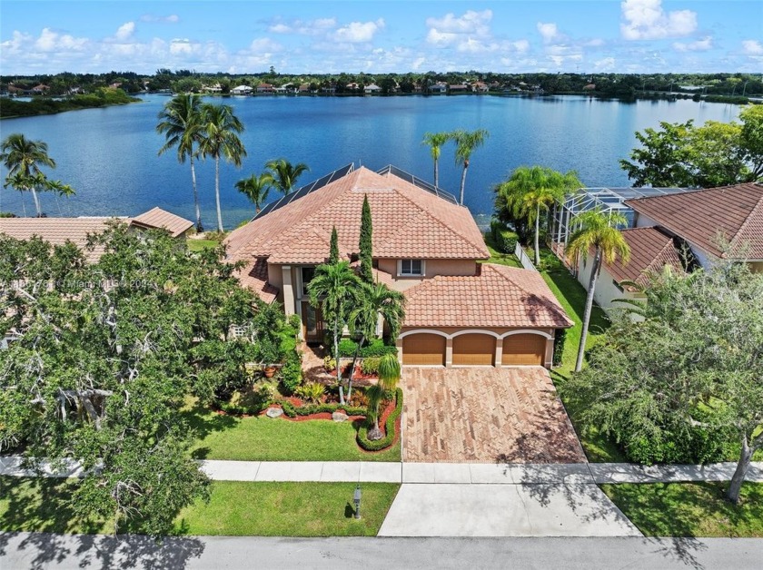 Enjoy breathtaking sunset views from this beautifully maintained - Beach Home for sale in Pembroke Pines, Florida on Beachhouse.com