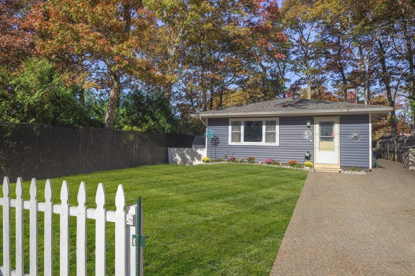 A beautifully maintained and thoughtfully updated home offering - Beach Home for sale in Mastic, New York on Beachhouse.com