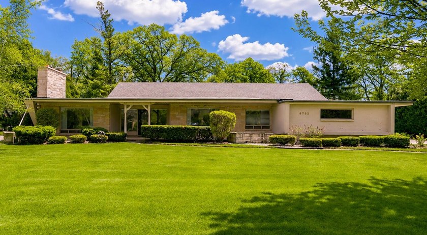 Beautifully updated stone ranch nestled on a stunning tree-lined - Beach Home for sale in Fox Point, Wisconsin on Beachhouse.com