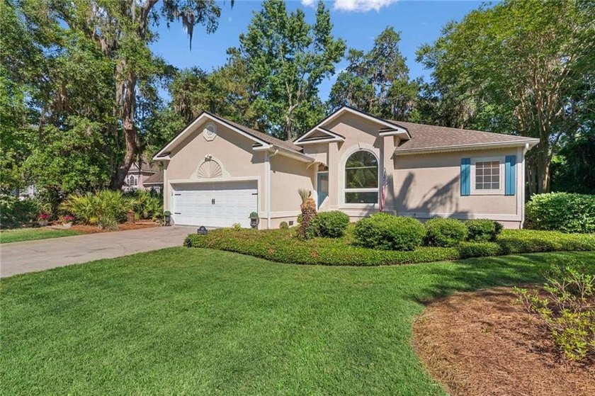 Tucked beneath a canopy of mature oaks in Oak Grove Island, this - Beach Home for sale in Brunswick, Georgia on Beachhouse.com