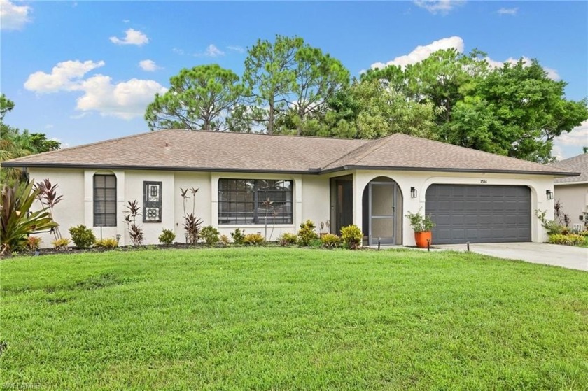 Welcome home to golf course living without the HOA! Located in a - Beach Home for sale in Naples, Florida on Beachhouse.com