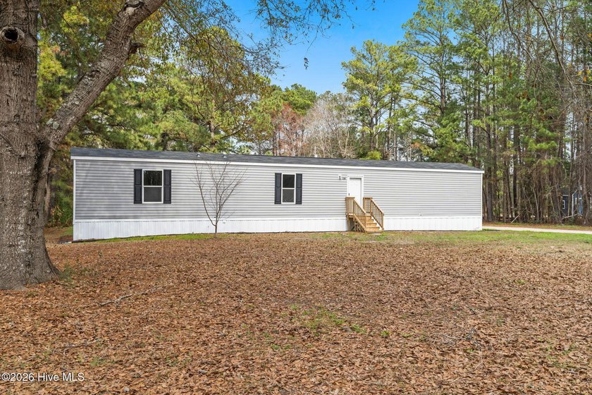 Move-in ready & new- this beautifully maintained home sits on a - Beach Home for sale in Supply, North Carolina on Beachhouse.com
