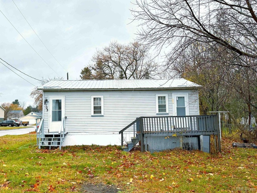 Welcome to 2103 Longyear Ave, an incredible opportunity to own a - Beach Home for sale in Marquette, Michigan on Beachhouse.com