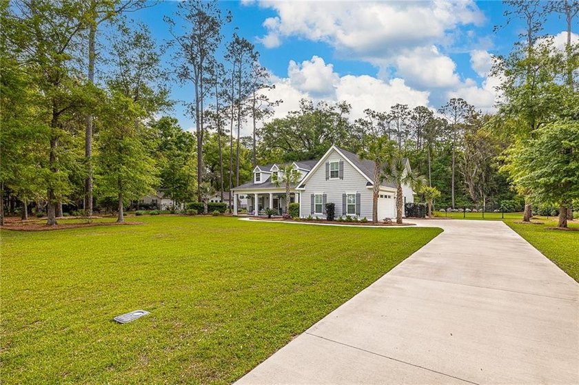 This almost-new home on Butler Lake Drive is one you'll want to - Beach Home for sale in Saint Simons, Georgia on Beachhouse.com