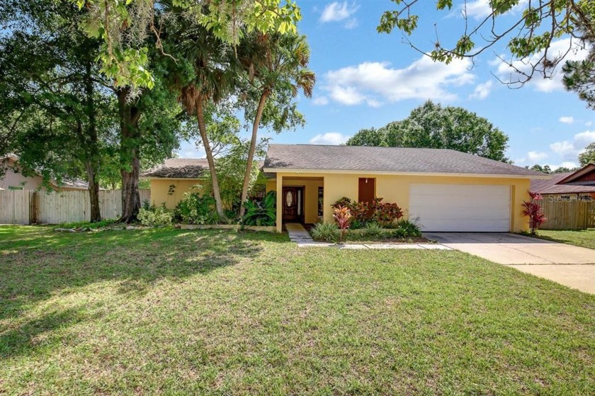 Location! Welcome to this Carrollwood Village pool home nestled - Beach Home for sale in Tampa, Florida on Beachhouse.com