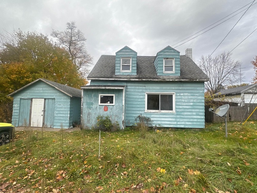 Discover the potential in this 2-bedroom, 1-bath home with - Beach Home for sale in Benton Harbor, Michigan on Beachhouse.com