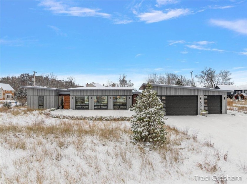 Experience modern luxury at this extraordinary retreat - Beach Home for sale in Spring Lake, Michigan on Beachhouse.com