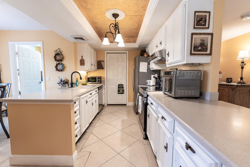 Elegant 3-bedroom, 2-bath residence located on the second floor - Beach Condo for sale in Palm Beach Gardens, Florida on Beachhouse.com