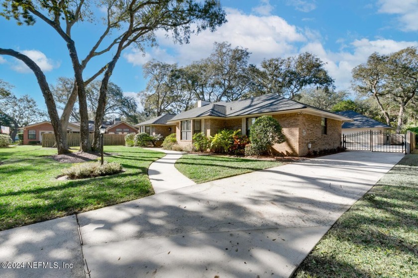 Sitting on a .4 acre lot on a cul-de-sac street, this lovely - Beach Home for sale in Neptune Beach, Florida on Beachhouse.com