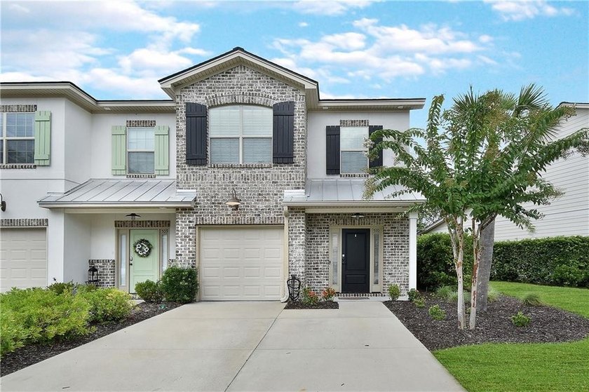 Experience Coastal elegance and convenient Island living in this - Beach Townhome/Townhouse for sale in Saint Simons, Georgia on Beachhouse.com