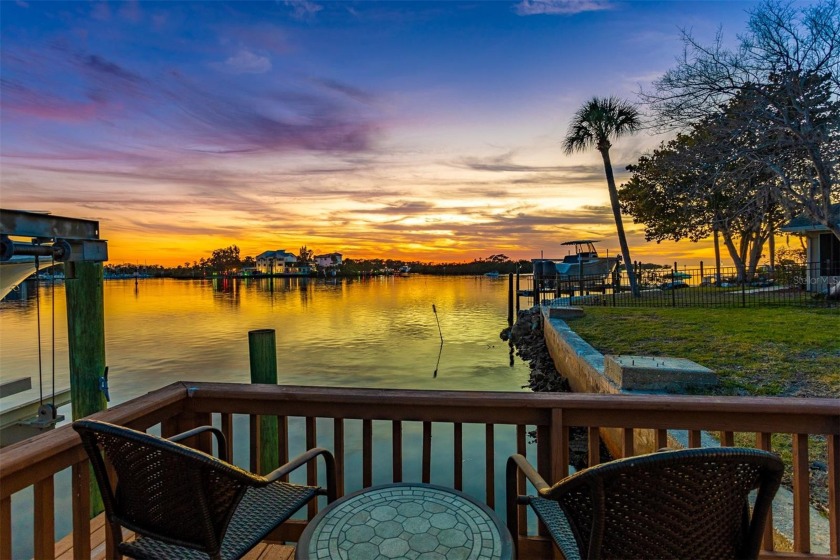 Indulge in the epitome of waterfront living at 8131 Channel Dr - Beach Home for sale in Port Richey, Florida on Beachhouse.com