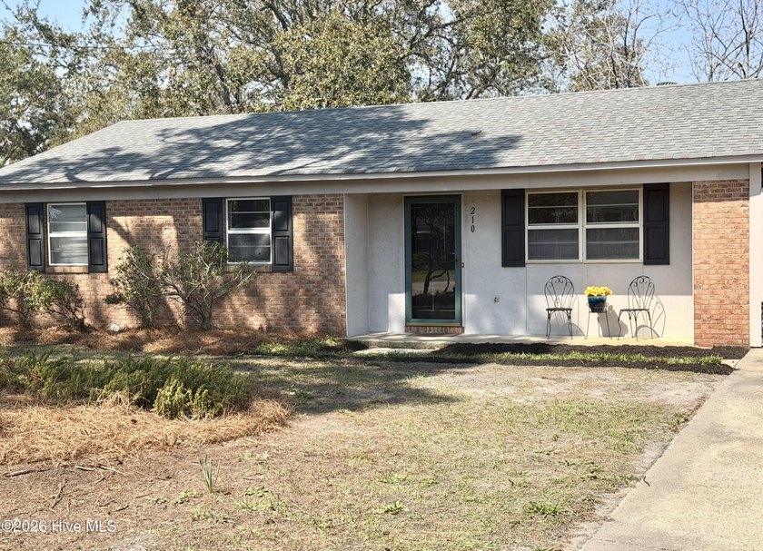 This charming single-story home features three bedrooms and one - Beach Home for sale in Wilmington, North Carolina on Beachhouse.com