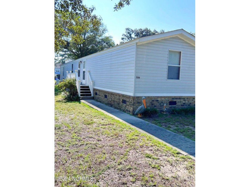 Wait until you visit this perfect 3 bedroom 2 bath home located - Beach Home for sale in Oak Island, North Carolina on Beachhouse.com