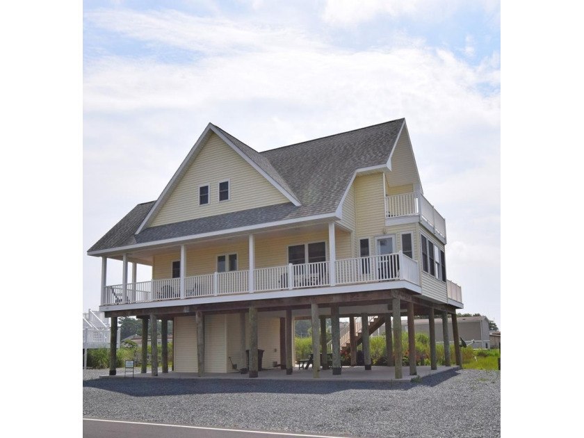 Three-bedroom waterfront Home with two piers! An 80-foot pier - Beach Home for sale in Chincoteague Island, Virginia on Beachhouse.com