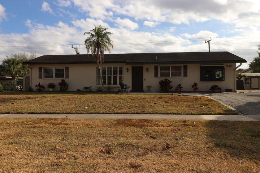 Spacious 3/2 home boasting 2350+ square feet under air with - Beach Home for sale in Lake Worth, Florida on Beachhouse.com