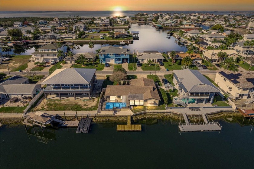 One or more photo(s) has been virtually staged. WATERFRONT POOL - Beach Home for sale in Hernando Beach, Florida on Beachhouse.com