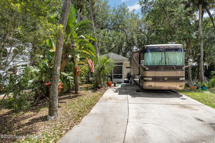 Welcome to this nicely shaded, extra wide exceptional RV lot - Beach Lot for sale in Titusville, Florida on Beachhouse.com