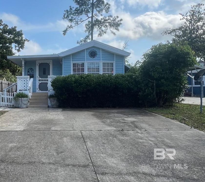 Welcome to your tranquil coastal escape! Nestled in a serene - Beach Home for sale in Lillian, Alabama on Beachhouse.com