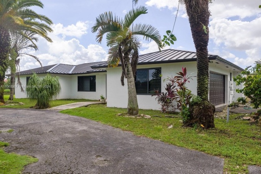 Welcome to this stunning 4-bedroom, 3-bathroom home at 17350 SW - Beach Home for sale in Homestead, Florida on Beachhouse.com