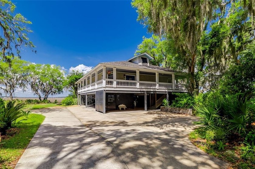 Spectacular waterfront home with private dock in Sutherland - Beach Home for sale in Townsend, Georgia on Beachhouse.com