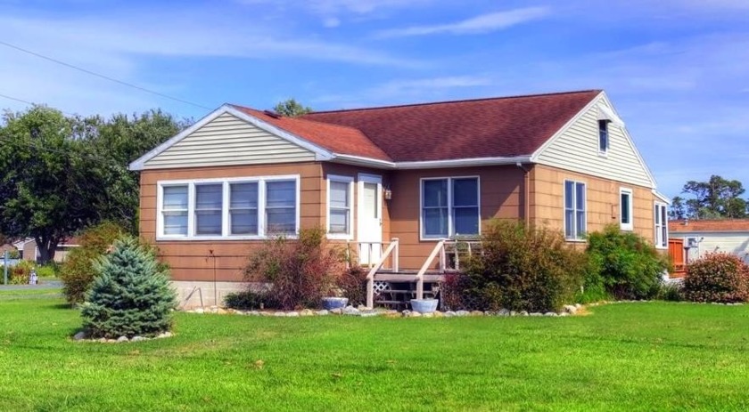 COTTAGE with WATERVIEWS ON HALF ACRE LARGE CORNER LOT! This - Beach Home for sale in Chincoteague Island, Virginia on Beachhouse.com