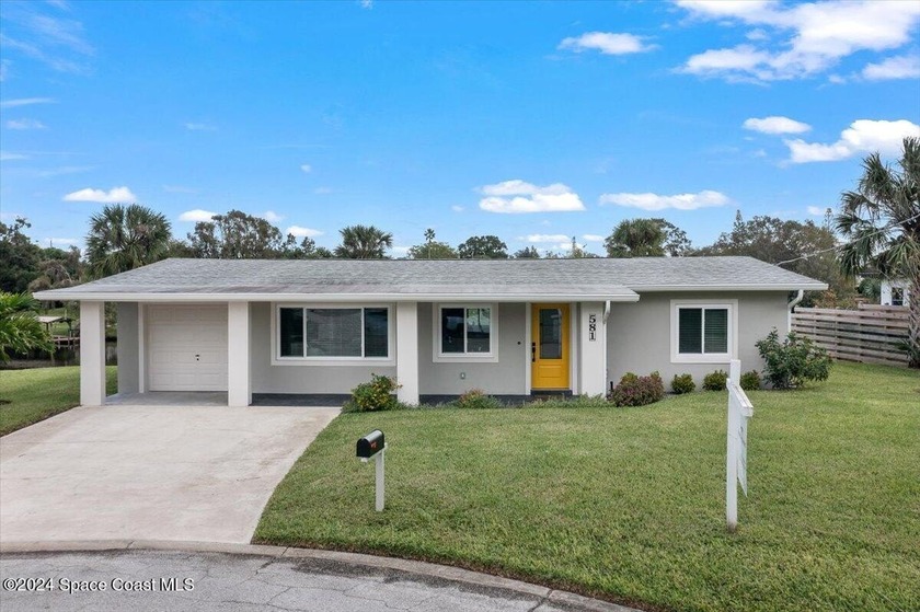 Tucked away at the end of a peaceful cul-de-sac, this completely - Beach Home for sale in Melbourne, Florida on Beachhouse.com