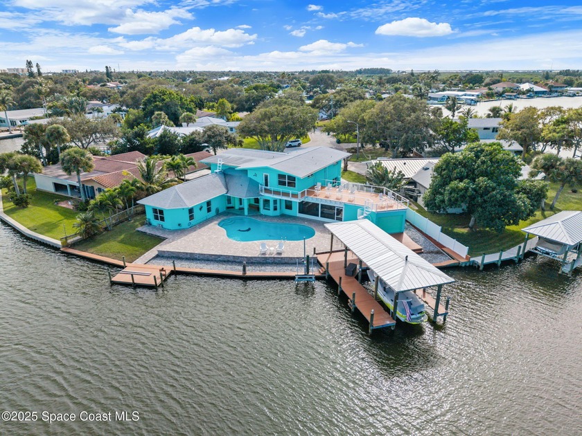 Your waterfront playground awaits! Enjoy 140 feet of direct - Beach Home for sale in Cocoa Beach, Florida on Beachhouse.com