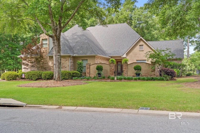 Step through the walled courtyard entrance into this exquisite - Beach Home for sale in Fairhope, Alabama on Beachhouse.com