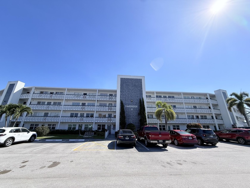 Lovely 2/2 with serene Grand LAKE VIEW, top floor catches the - Beach Condo for sale in Deerfield Beach, Florida on Beachhouse.com