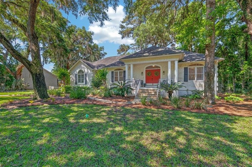 Beautiful home located under a canopy of oaks at West Point - Beach Home for sale in Saint Simons, Georgia on Beachhouse.com