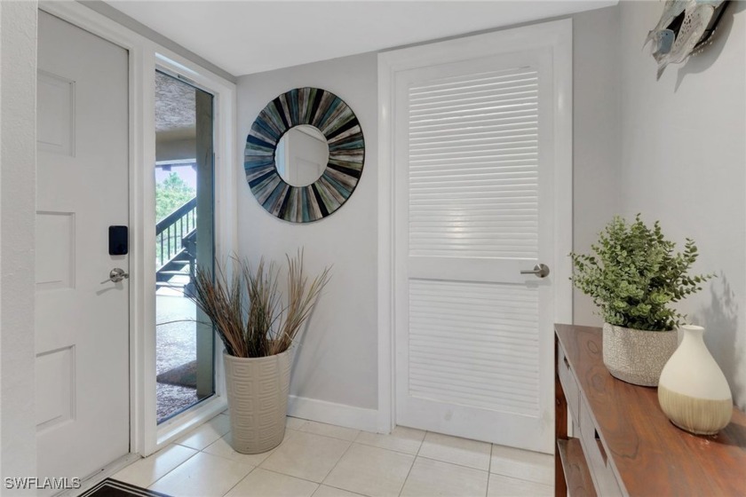 Wake up to sweeping lake views in this beautifully updated - Beach Condo for sale in Fort Myers, Florida on Beachhouse.com