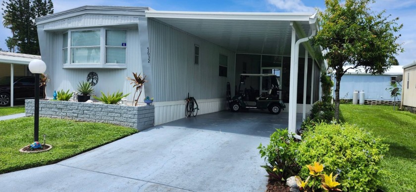 Nestled in a vibrant 40+ community, this charming and partially - Beach Home for sale in Bradenton, Florida on Beachhouse.com