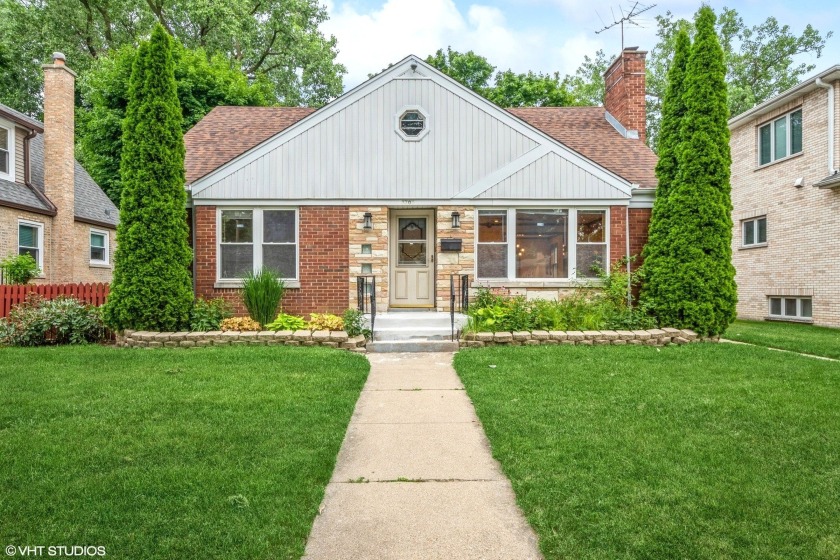 Welcome home to this nicely updated brick and stone home sitting - Beach Home for sale in Skokie, Illinois on Beachhouse.com