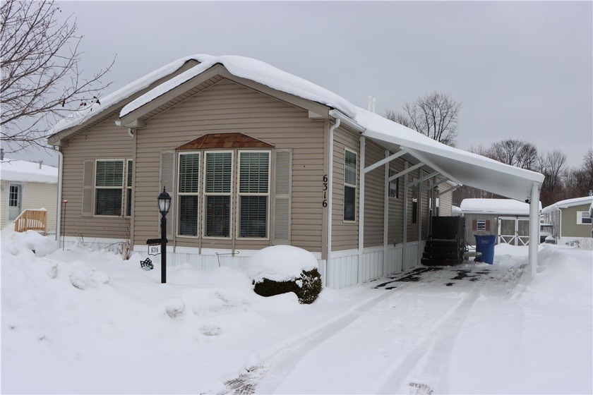 Take a look at this better-than-new, nearly 1,800 sq. ft - Beach Home for sale in Williamson, New York on Beachhouse.com