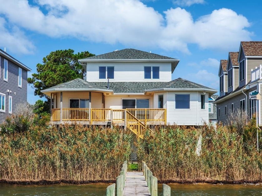 Situated on the beautiful and serene Chincoteague Bay is this - Beach Home for sale in Greenbackville, Virginia on Beachhouse.com