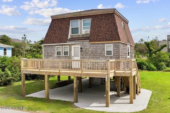 This beautifully updated coastal retreat is located just 400 - Beach Home for sale in Waves, North Carolina on Beachhouse.com