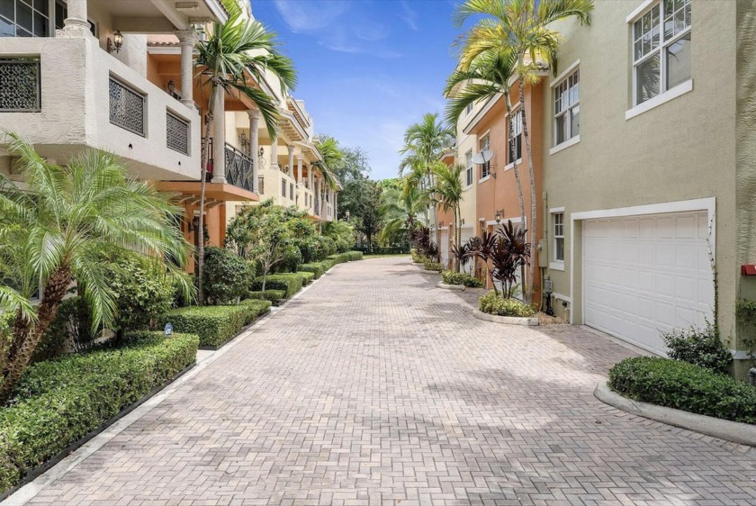 Discover a rare end-unit opportunity in this inviting 3-story - Beach Townhome/Townhouse for sale in Lake Worth Beach, Florida on Beachhouse.com